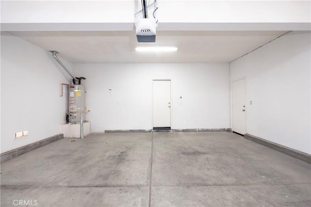 38133 Mendocino Way, Palmdale, CA 93550 - garage with strapped water heater and a garage door opener