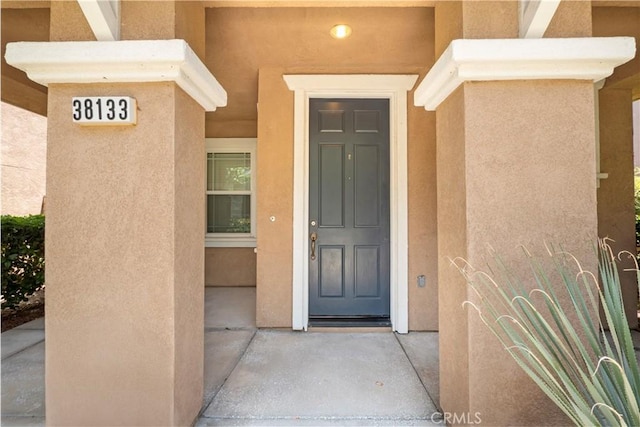 38133 Mendocino Way, Palmdale, CA 93550 - property entrance featuring stucco siding