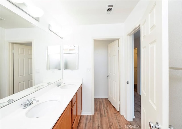 38133 Mendocino Way, Palmdale, CA 93550 - full bathroom with double vanity and wood finished floors