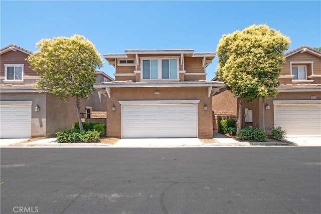 38133 Mendocino Way, Palmdale, CA 93550 - view of front of home with stucco siding and an attached garage
