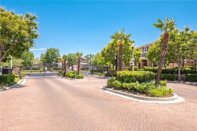38133 Mendocino Way, Palmdale, CA 93550 - view of decorative street with a gate, curbs, and a gated entry