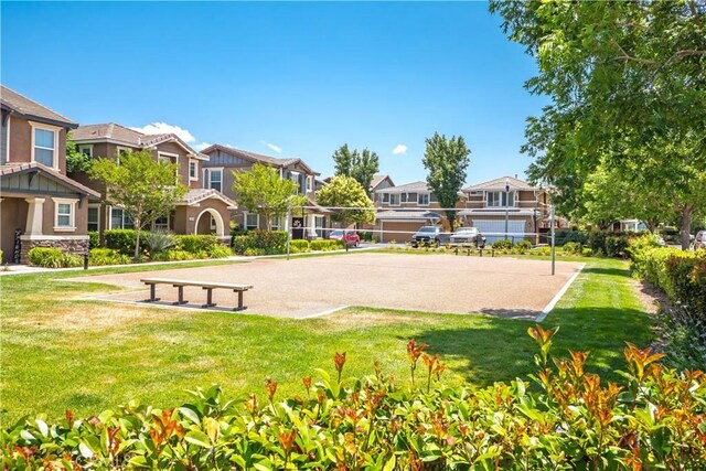 38133 Mendocino Way, Palmdale, CA 93550 - view of home's community featuring a residential view, volleyball court, and a yard