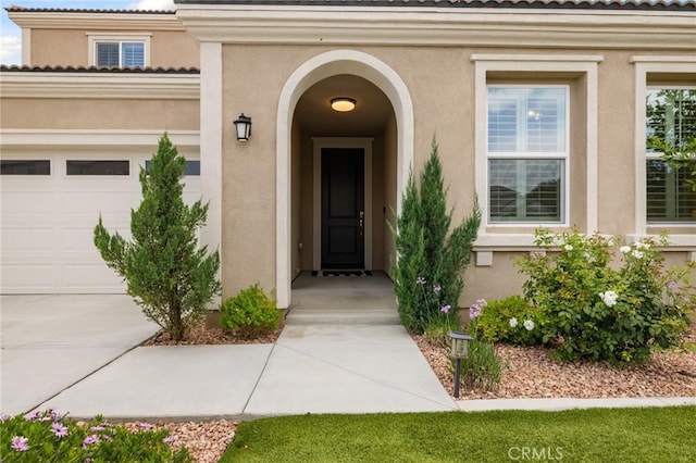 29273 Caravel Dr, Menifee, CA 92585 - entrance to property with stucco siding and an attached garage
