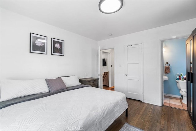 1335 W Burnett St, Long Beach, CA 90810 - bedroom with dark wood-type flooring and connected bathroom