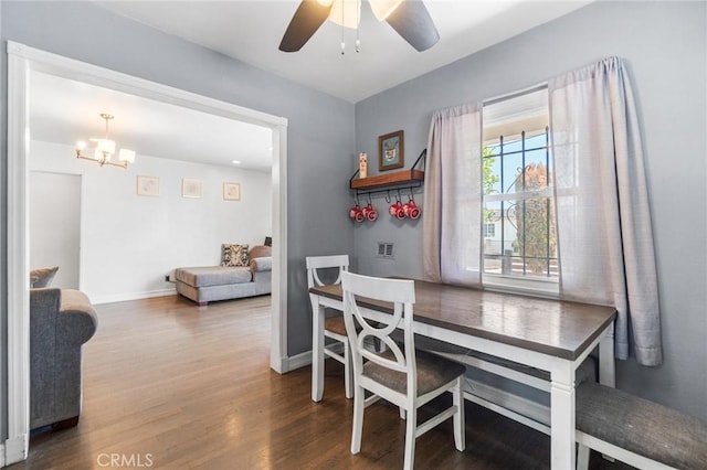 1335 W Burnett St, Long Beach, CA 90810 - dining room with wood finished floors, ceiling fan, and a chandelier