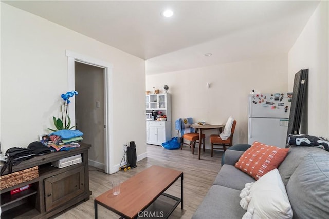 1335 W Burnett St, Long Beach, CA 90810 - living area with light wood-type flooring and recessed lighting