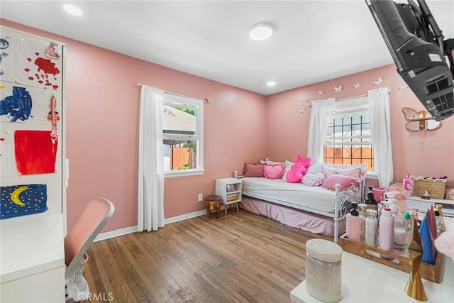 1335 W Burnett St, Long Beach, CA 90810 - bedroom featuring wood finished floors, freestanding refrigerator, and recessed lighting