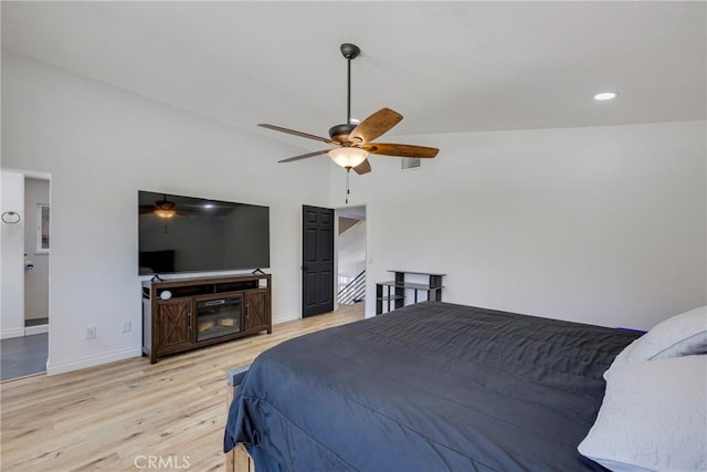 2578 Bryce Ct, Colton, CA 92324 - bedroom with light wood-type flooring, a ceiling fan, and vaulted ceiling