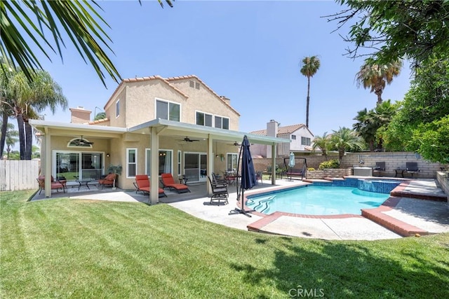 2578 Bryce Ct, Colton, CA 92324 - view of pool with ceiling fan, a fenced backyard, a patio area, and a pool with connected hot tub