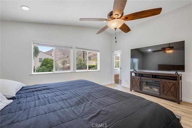 2578 Bryce Ct, Colton, CA 92324 - bedroom with lofted ceiling, wood finished floors, and a ceiling fan