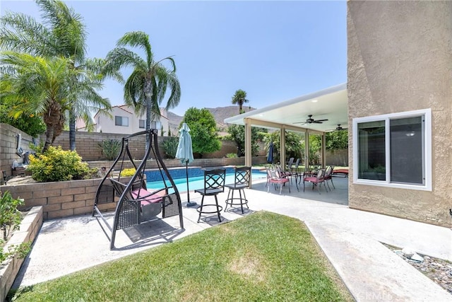 2578 Bryce Ct, Colton, CA 92324 - view of swimming pool featuring a fenced backyard, ceiling fan, and a patio