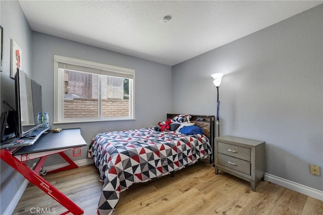 2578 Bryce Ct, Colton, CA 92324 - bedroom with light wood-style flooring