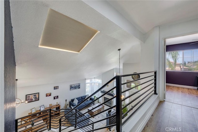 2578 Bryce Ct, Colton, CA 92324 - staircase featuring healthy amount of natural light and wood finished floors