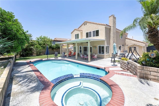 2578 Bryce Ct, Colton, CA 92324 - view of pool with a pool with connected hot tub and a patio area