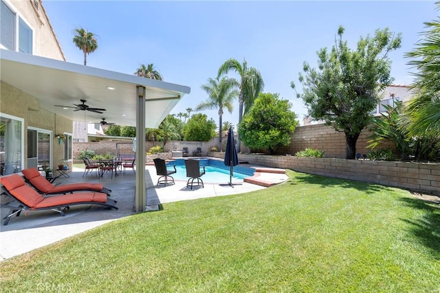 2578 Bryce Ct, Colton, CA 92324 - fenced backyard with ceiling fan and a patio area