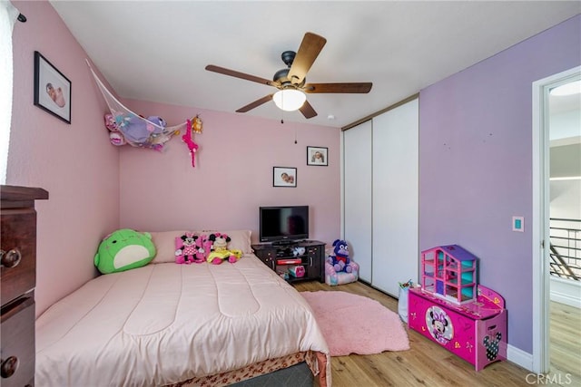 2578 Bryce Ct, Colton, CA 92324 - bedroom featuring wood finished floors, a closet, and ceiling fan