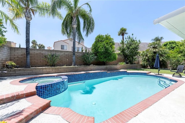 2578 Bryce Ct, Colton, CA 92324 - view of pool featuring a fenced backyard and a pool with connected hot tub