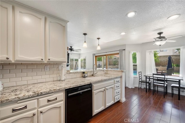2578 Bryce Ct, Colton, CA 92324 - kitchen featuring black dishwasher, a ceiling fan, a peninsula, decorative backsplash, and a textured ceiling