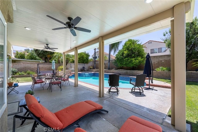 2578 Bryce Ct, Colton, CA 92324 - fenced backyard with a patio, ceiling fan, and a pool with connected hot tub