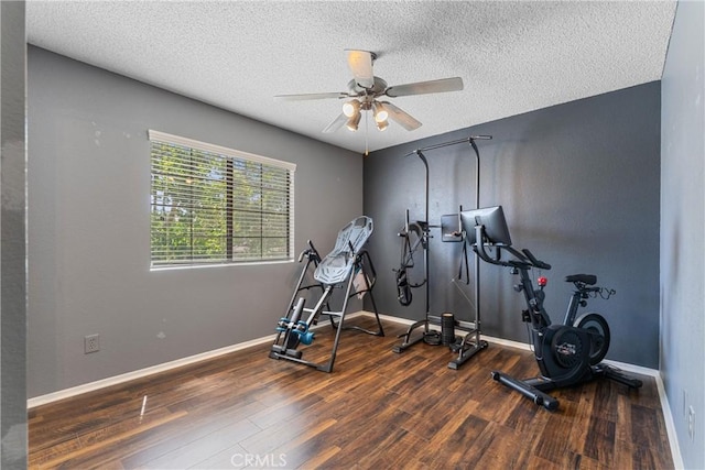 44125 Dusty Rd, Lancaster, CA 93536 - exercise room featuring wood finished floors, ceiling fan, and a textured ceiling