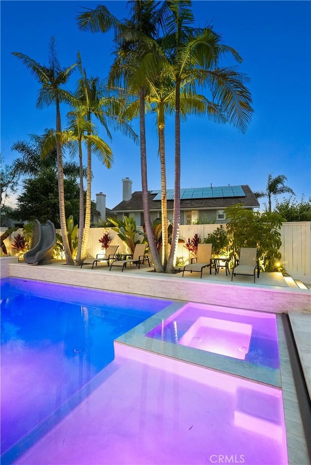 705 El Berro, San Clemente, CA 92672 - view of pool with a water slide and an in-ground hot tub