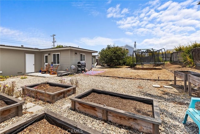 733 Lilac Dr, Los Osos, CA 93402 - view of yard with a garden and a trampoline