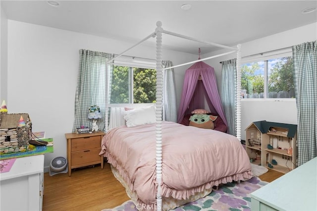 733 Lilac Dr, Los Osos, CA 93402 - bedroom featuring multiple windows and light wood-style floors