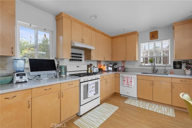 733 Lilac Dr, Los Osos, CA 93402 - kitchen with white appliances, under cabinet range hood, light countertops, and recessed lighting
