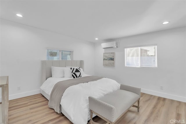 2697 Merced St, Los Angeles, CA 90065 - bedroom with a wall unit AC, light wood finished floors, and recessed lighting
