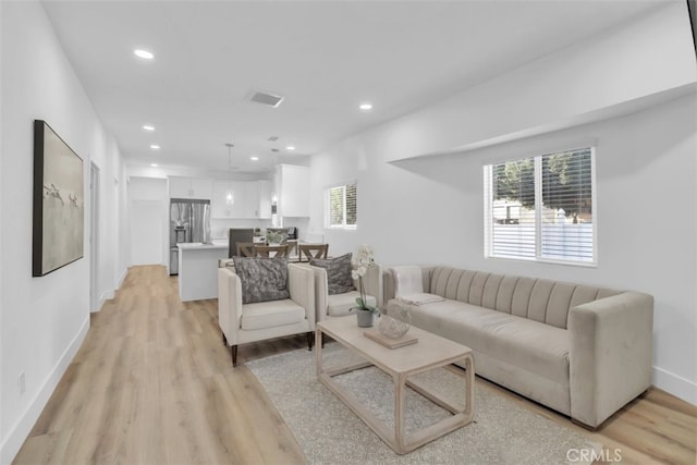 2697 Merced St, Los Angeles, CA 90065 - living area with light wood finished floors and recessed lighting