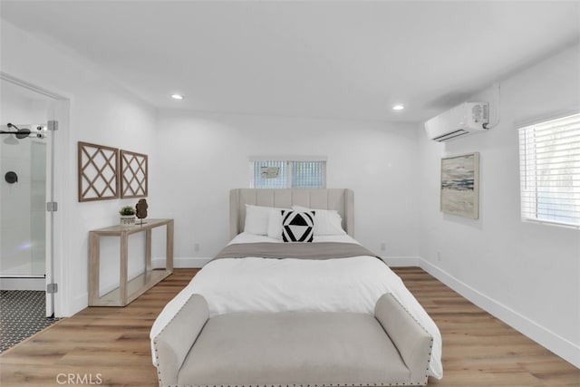 2697 Merced St, Los Angeles, CA 90065 - bedroom with an AC wall unit, wood finished floors, and recessed lighting