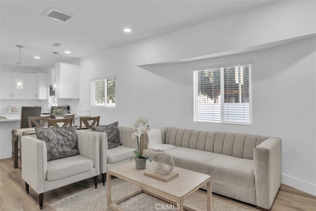 2697 Merced St, Los Angeles, CA 90065 - living room featuring light wood-type flooring and recessed lighting
