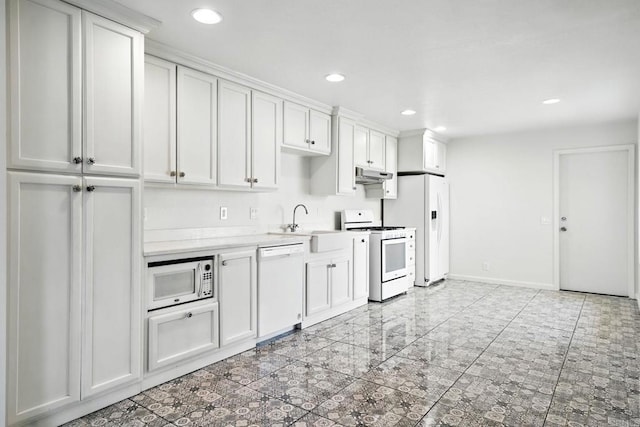 575 Otay Lakes Rd Unit 26, Chula Vista, CA 91913 - kitchen featuring white appliances, under cabinet range hood, light countertops, recessed lighting, and white cabinetry