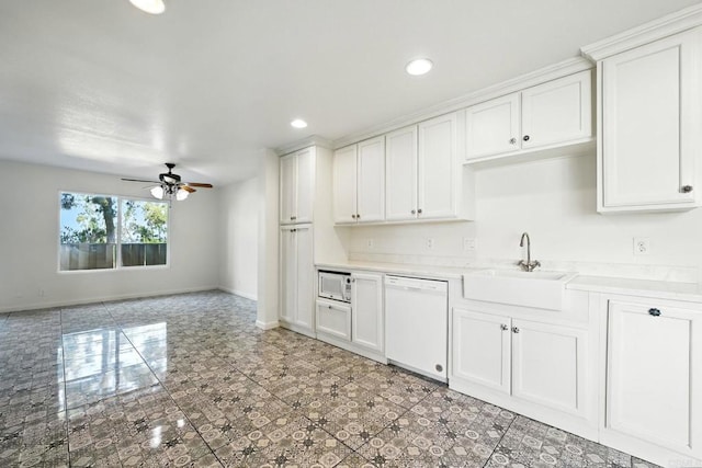 575 Otay Lakes Rd Unit 26, Chula Vista, CA 91913 - kitchen with white appliances, ceiling fan, light countertops, white cabinets, and recessed lighting