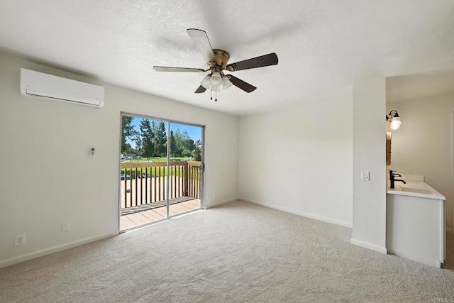 575 Otay Lakes Rd Unit 26, Chula Vista, CA 91913 - carpeted empty room with a wall mounted AC and ceiling fan