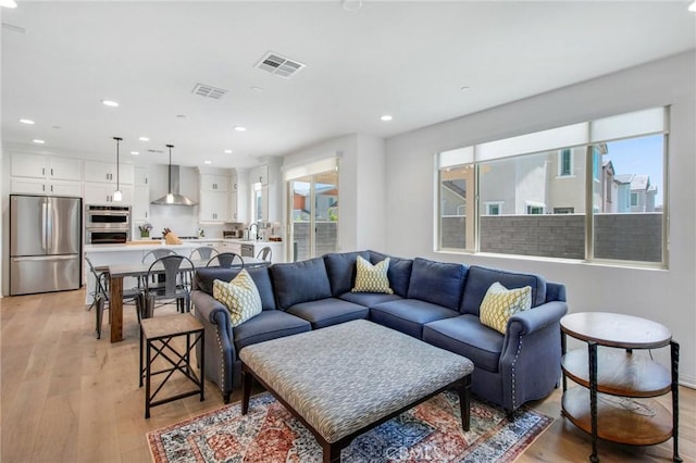 783 Longhorn, Rancho Mission Viejo, CA 92694 - living room featuring light wood finished floors and recessed lighting