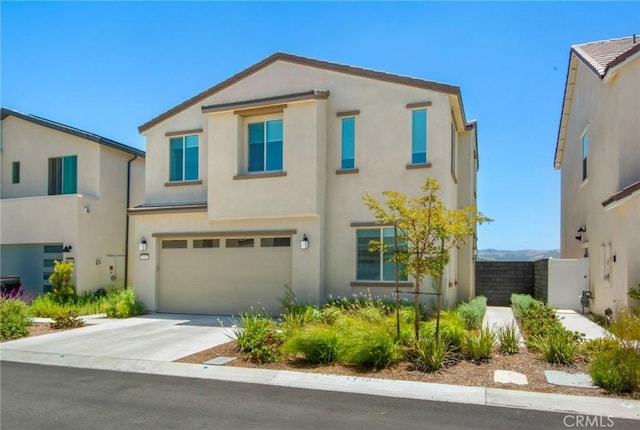 783 Longhorn, Rancho Mission Viejo, CA 92694 - view of front of property featuring an attached garage, driveway, and stucco siding
