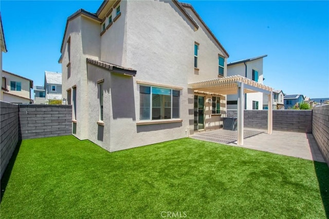 783 Longhorn, Rancho Mission Viejo, CA 92694 - back of house featuring a pergola, stucco siding, a fenced backyard, and a patio area