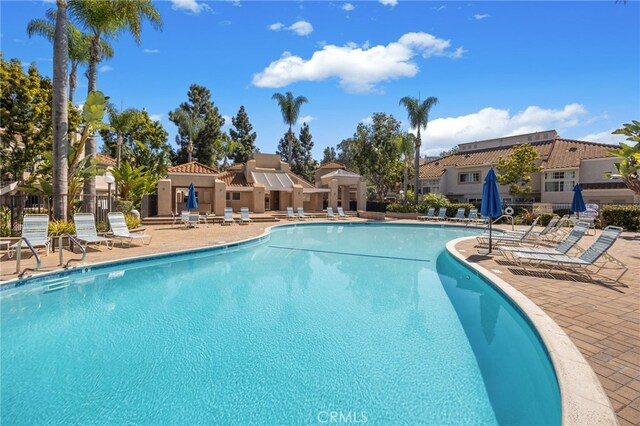 24461 Howes Dr, Laguna Niguel, CA 92677 - community pool with a patio area and a residential view