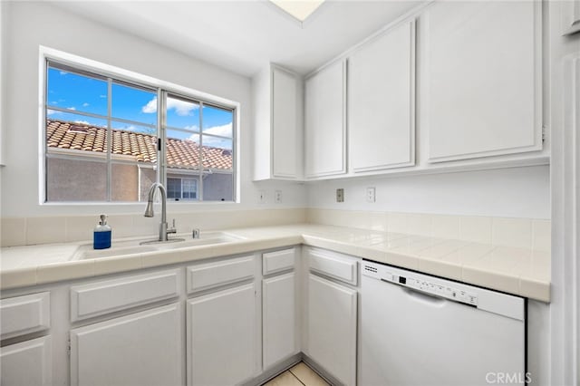 24461 Howes Dr, Laguna Niguel, CA 92677 - kitchen with dishwasher and white cabinets