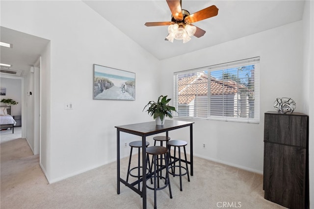 24461 Howes Dr, Laguna Niguel, CA 92677 - dining space with light colored carpet, lofted ceiling, and ceiling fan