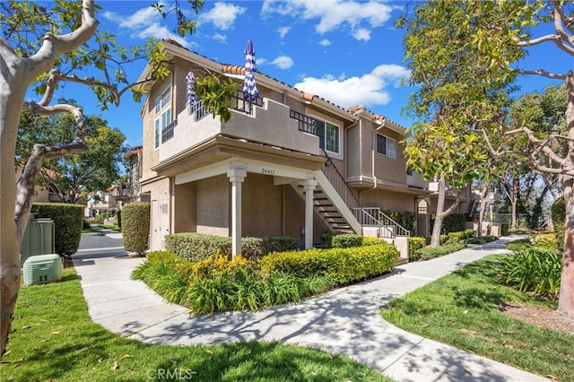 24461 Howes Dr, Laguna Niguel, CA 92677 - view of front of home with stairs and stucco siding