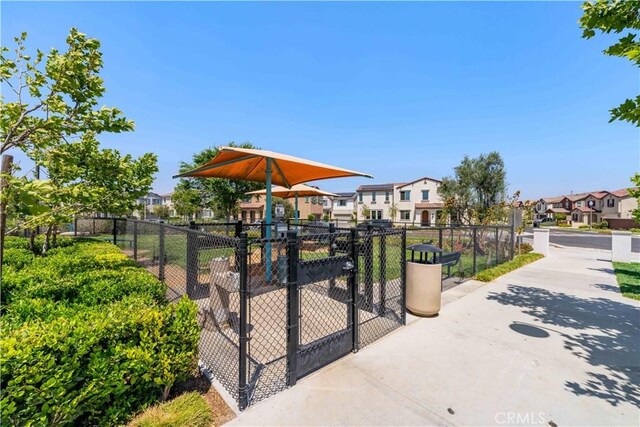 16526 Trailblazer Ave, Chino, CA 91708 - view of community featuring a residential view and a gate