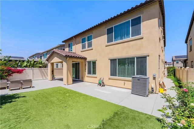 16526 Trailblazer Ave, Chino, CA 91708 - rear view of house featuring a patio area, a fenced backyard, stucco siding, and a tile roof