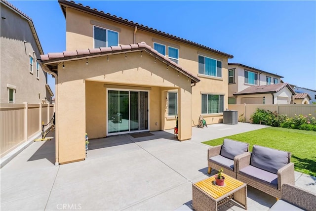 16526 Trailblazer Ave, Chino, CA 91708 - back of house featuring stucco siding, a fenced backyard, a patio, and an outdoor hangout area