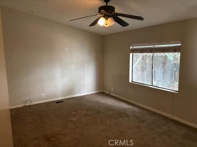 10450 Stageline St, Corona, CA 92883 - carpeted spare room with baseboards and a ceiling fan