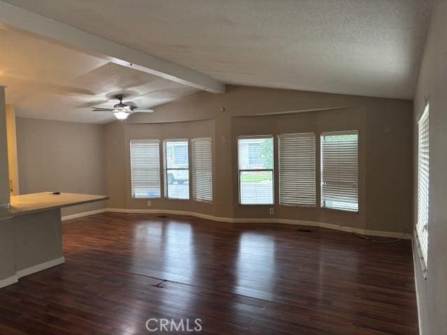 10450 Stageline St, Corona, CA 92883 - unfurnished living room with wood finished floors, ceiling fan, and a textured ceiling