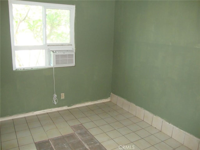 2100 W Dogwood Ave, Anaheim, CA 92801 - tiled spare room featuring plenty of natural light and cooling unit
