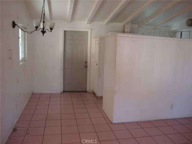 2100 W Dogwood Ave, Anaheim, CA 92801 - hallway featuring beamed ceiling, light tile patterned flooring, and a chandelier