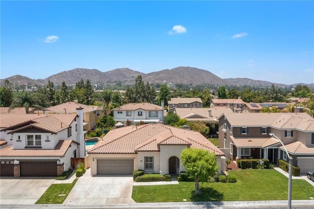 11529 Trailrun Ct, Riverside, CA 92505 - view of front of property with a residential view, driveway, stucco siding, and a mountain view